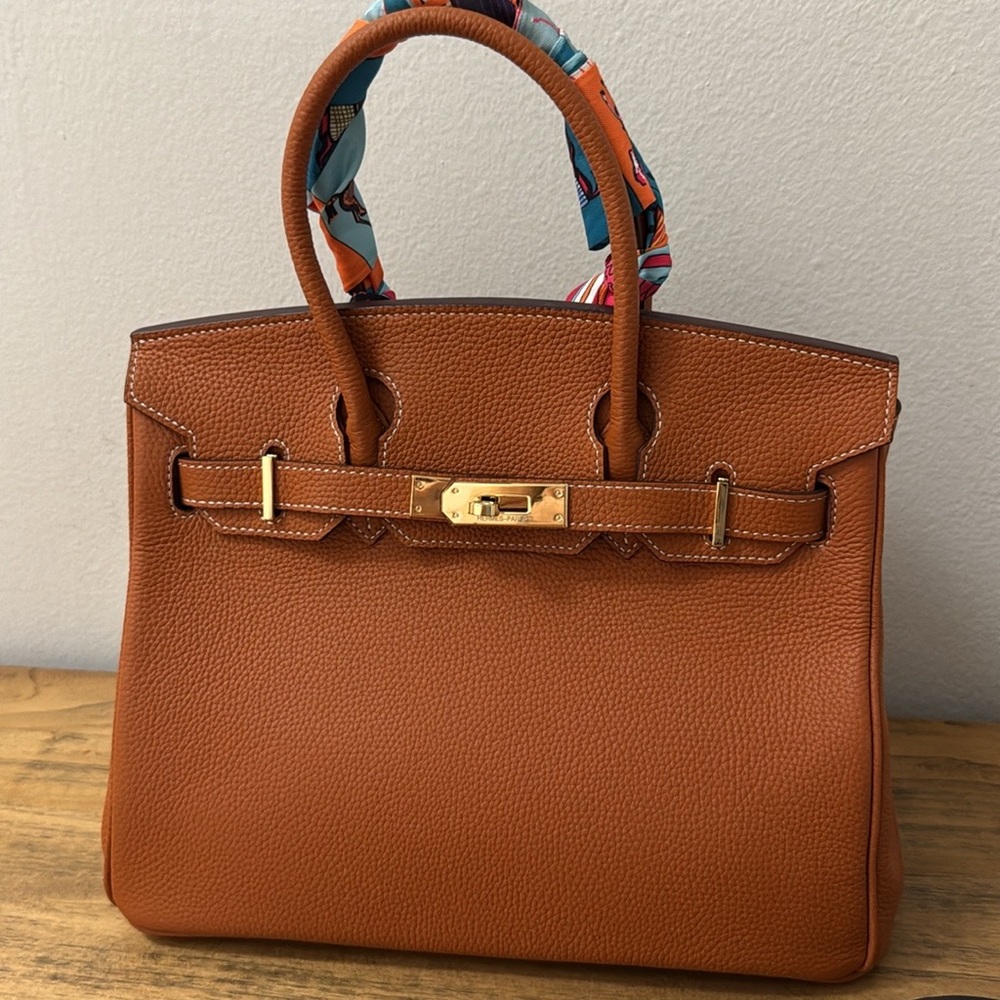 Togo genuine Leather Handbag timeless style color rich brown very good quality